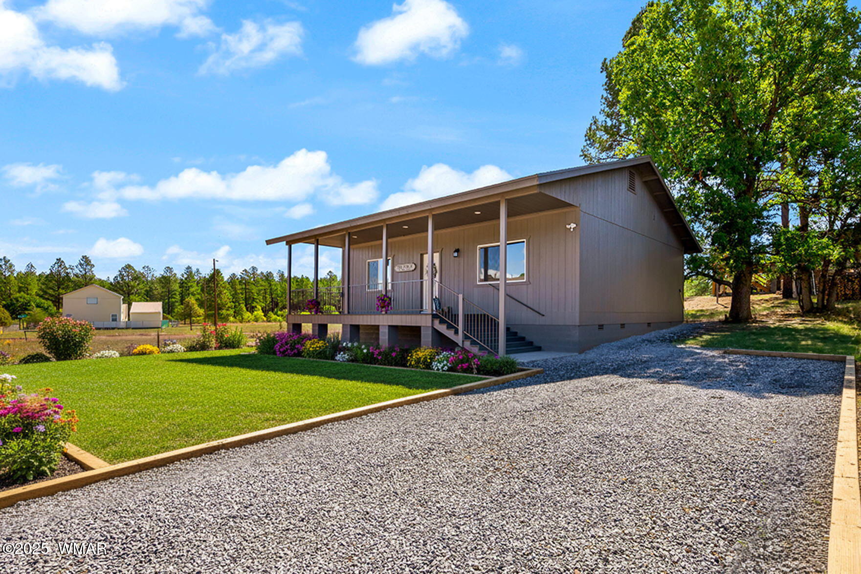 5523 Turkey Run Road Pinedale, AZ 85934 - Photo 4 of 34 a view of a house with backyard and garden