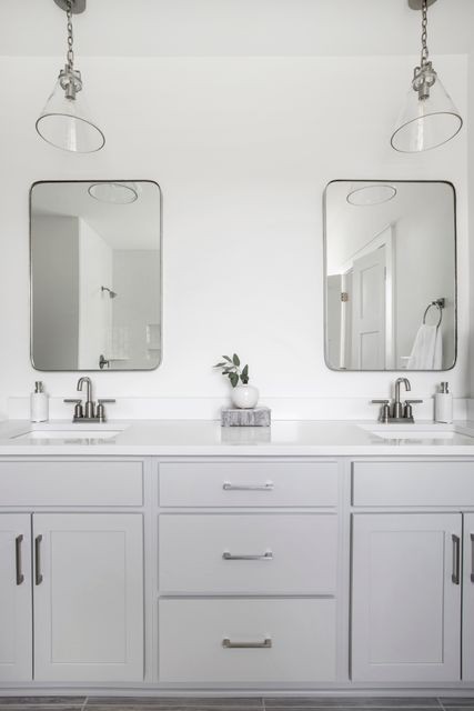 838 Sugarbush Lane Spring Hill, TN 37174 - Photo 12 of 26 a bathroom with a double vanity sink and mirror