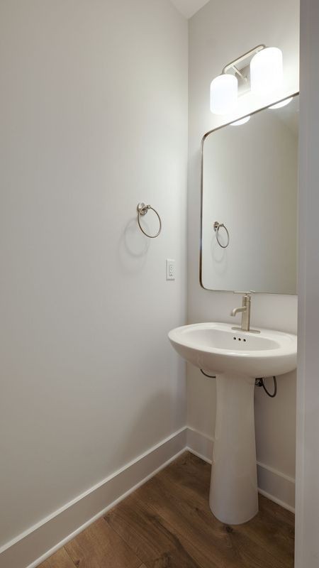 838 Sugarbush Lane Spring Hill, TN 37174 - Photo 18 of 26 a bathroom with a sink and mirror
