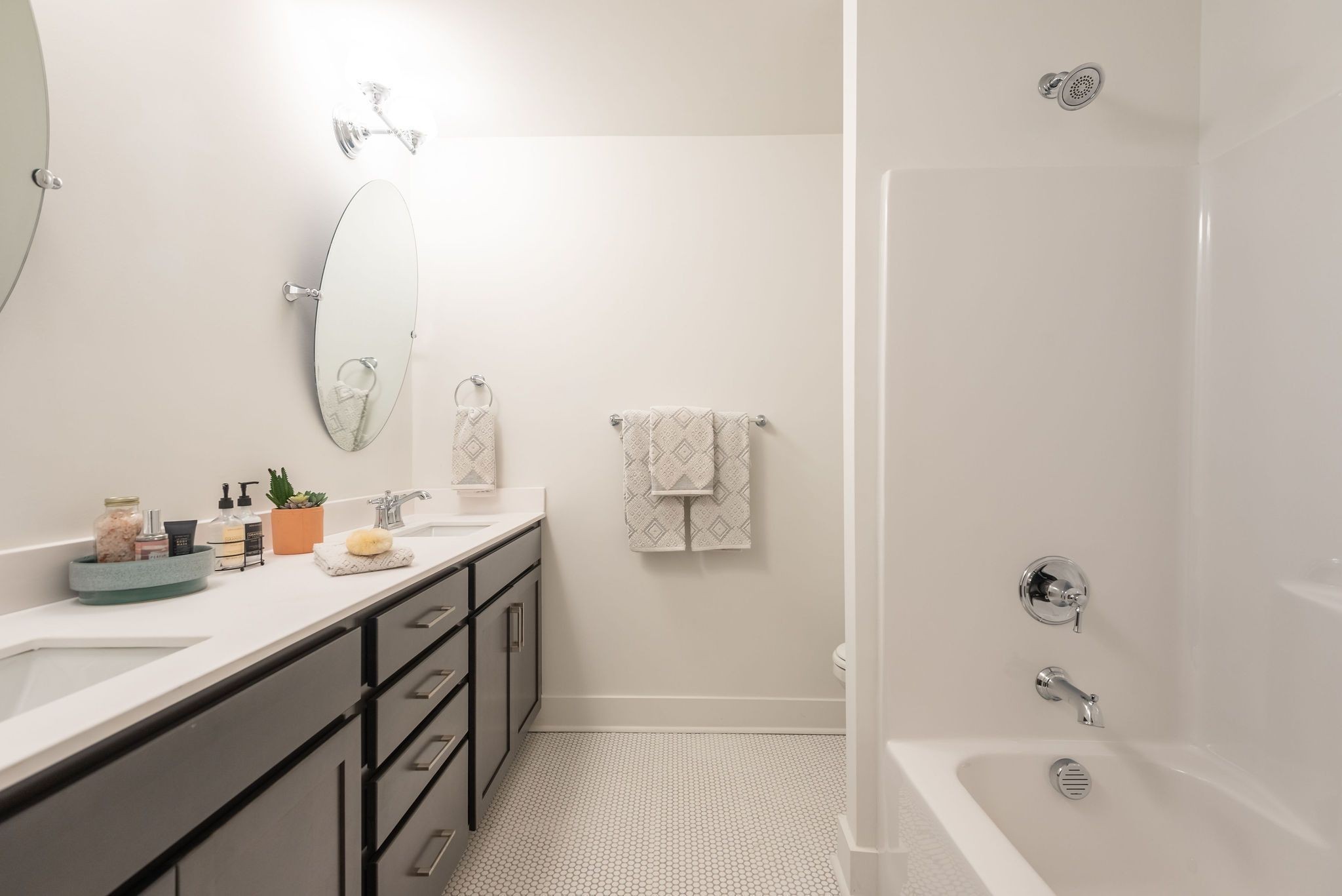 838 Sugarbush Lane Spring Hill, TN 37174 - Photo 25 of 26 a bathroom with a granite countertop sink and a mirror