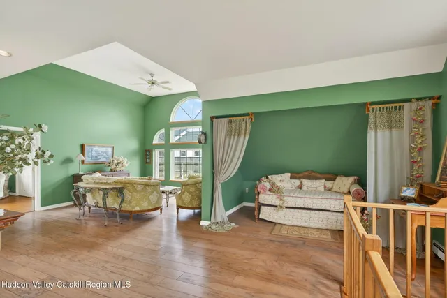 a view of a table and chairs in the garden