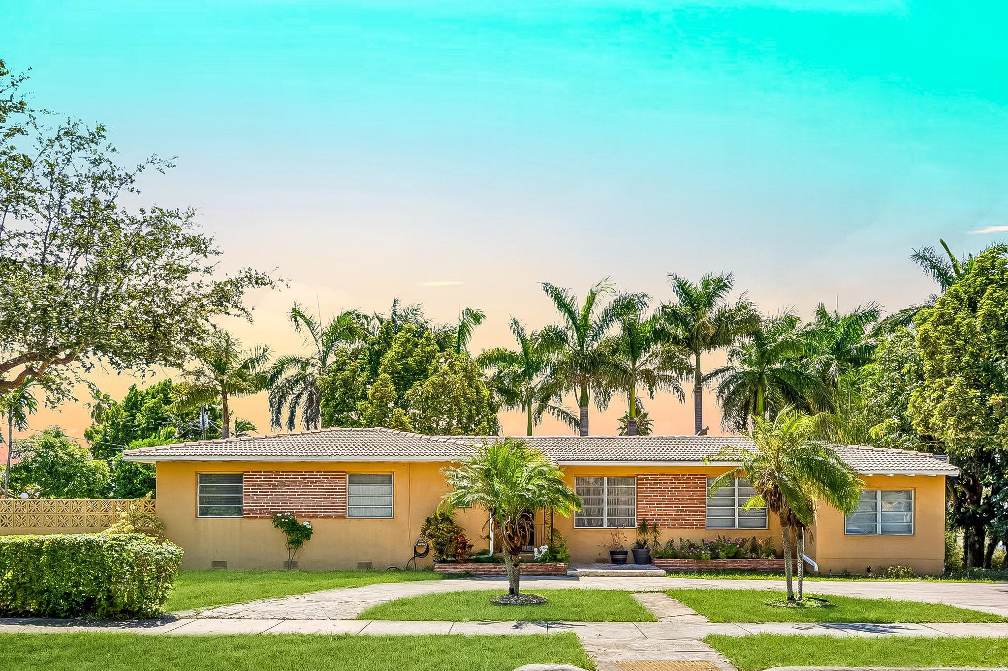 front view of a house with a yard