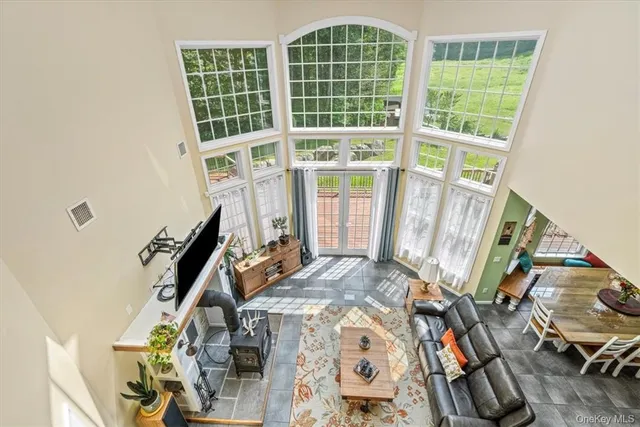 a kitchen with kitchen island granite countertop a sink and cabinets