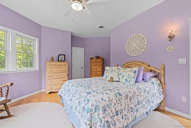 a bedroom with furniture and a bed