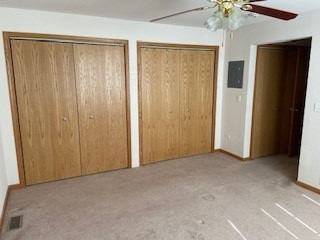 788 Highview Drive, Unit 2 Antioch, IL 60002 - Photo 12 of 13 an empty room with chandelier fan