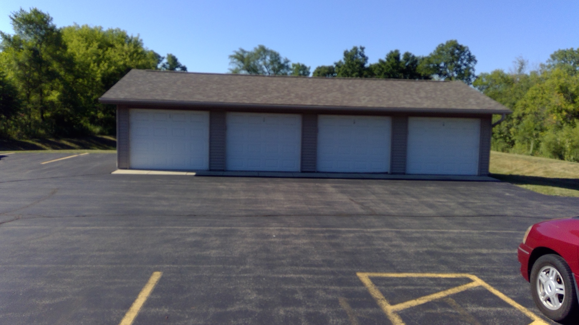 788 Highview Drive, Unit 2 Antioch, IL 60002 - Photo 13 of 13 a house with trees in the background