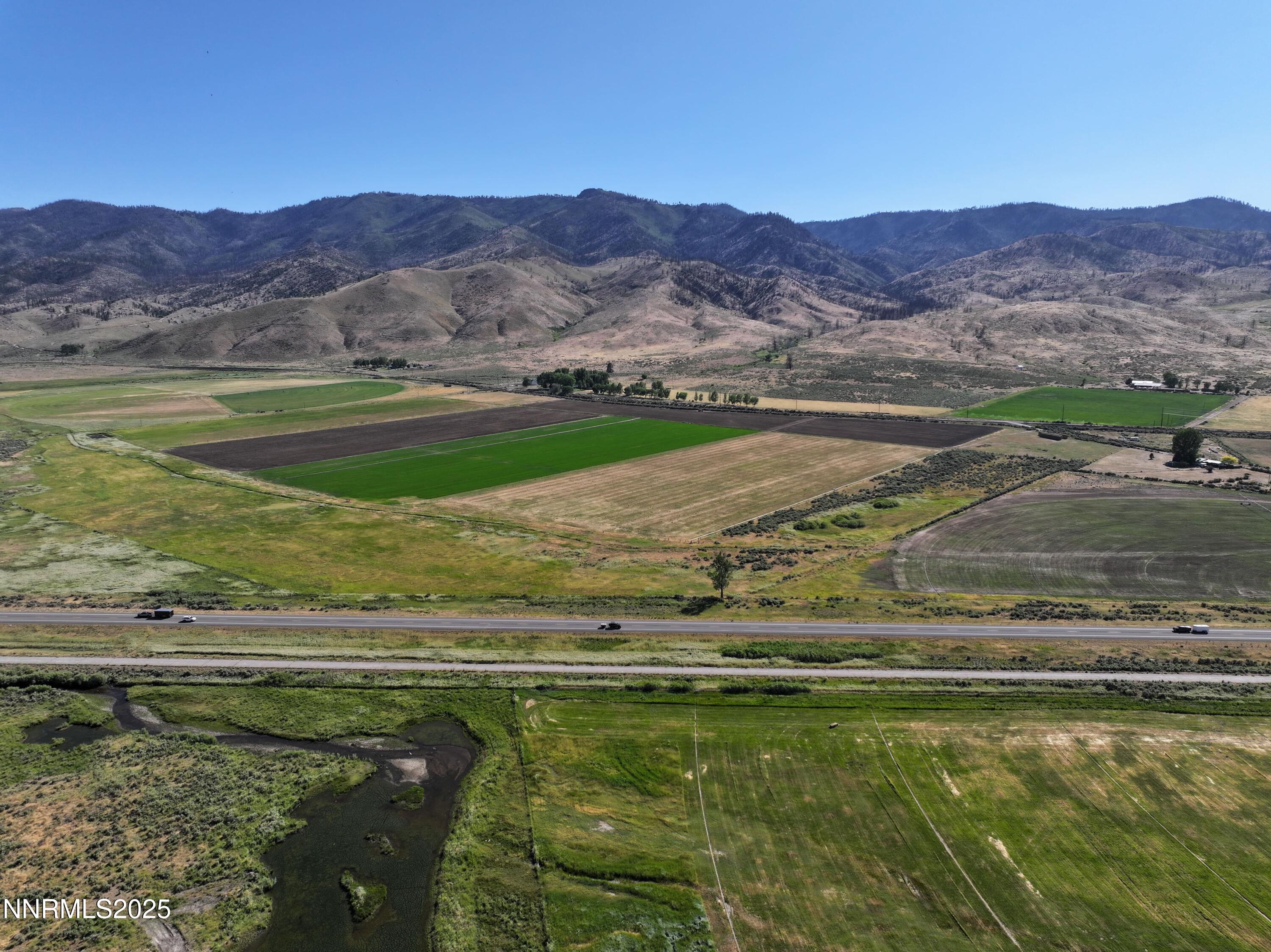 432-250 Constantia Road Doyle, CA 96109 - Photo 12 of 54 a view of a lake with a mountain