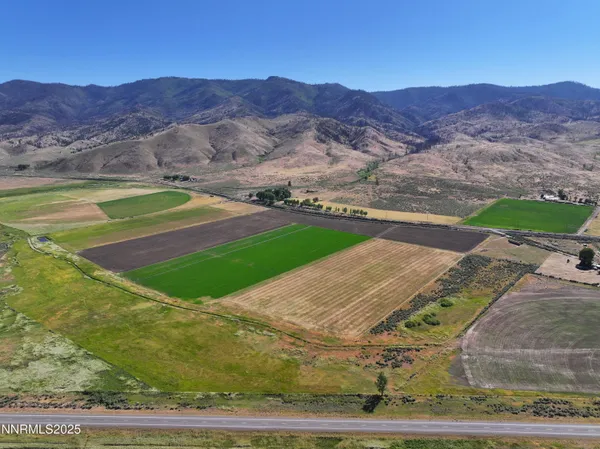 a view of a backyard with mountain view
