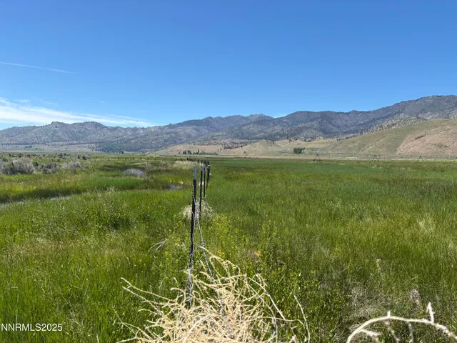 a view of a lake with a mountain