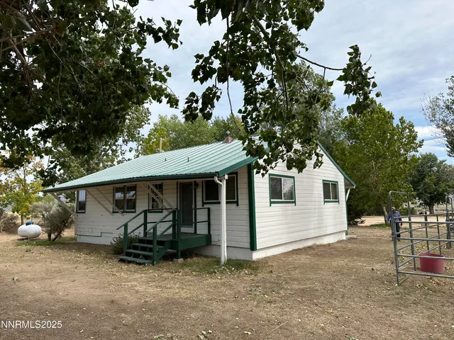 a view of a terrace with a lake view