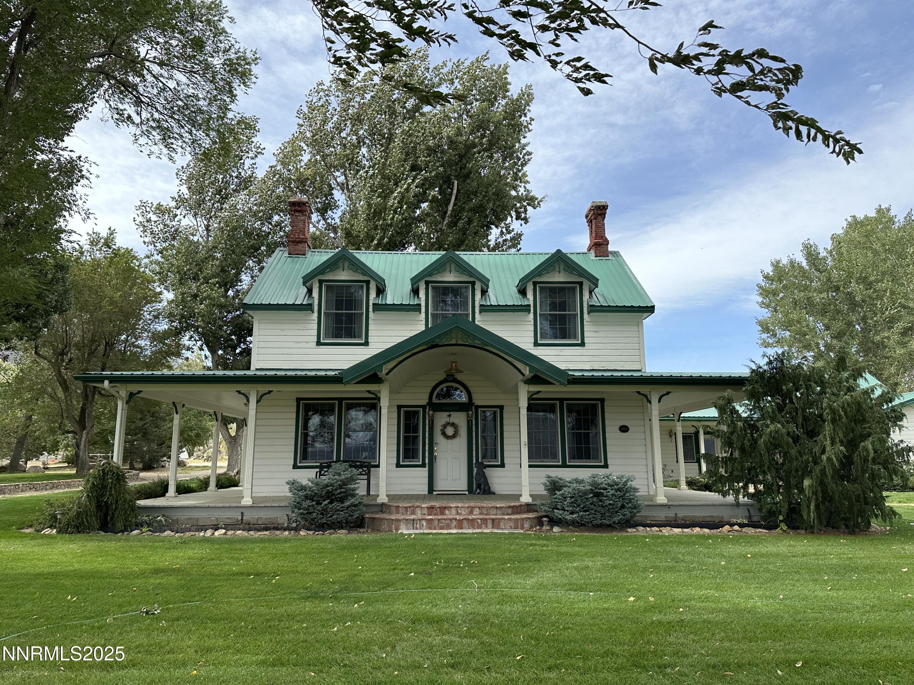 432-250 Constantia Road Doyle, CA 96109 - Photo 53 of 54 a front view of a house with a garden and porch