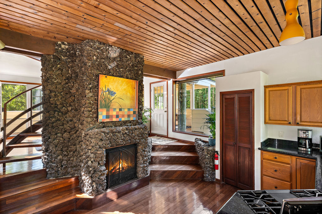 1444 East Kuiaha Road Haiku, HI 96708 - Photo 20 of 30 a view of a porch with furniture and a fireplace