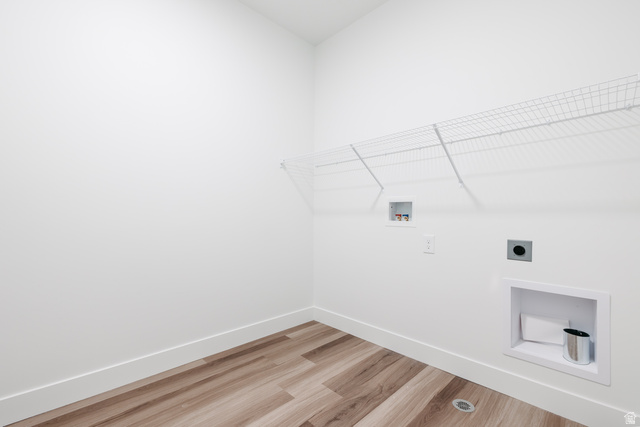 4653 South Alder Drive, Unit H303 Mapleton, UT 84664 - Photo 14 of 15 Laundry room with electric dryer hookup, wood finished floors, and washer hookup