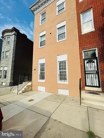 a view of a building with a street