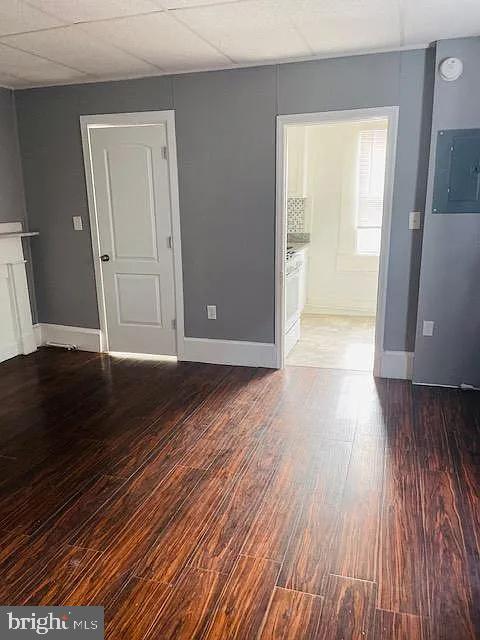 1112 North Eden Street Baltimore, MD 21213 - Photo 16 of 16 a view of an empty room and wooden floor