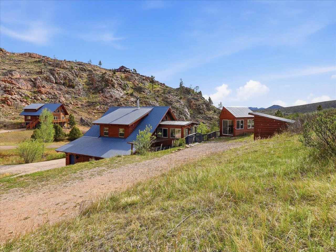 1652 Eiger Road Livermore, CO 80536 - Photo 41 of 50 Rock Croppings surround the home. No need to forage- pick horseradish, rhubard, and wild raspberries right by your home!