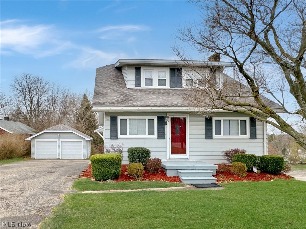 507 Canton Road Wintersville, OH 43953 - Photo 41 of 45 View of front property with a front yard and a garage