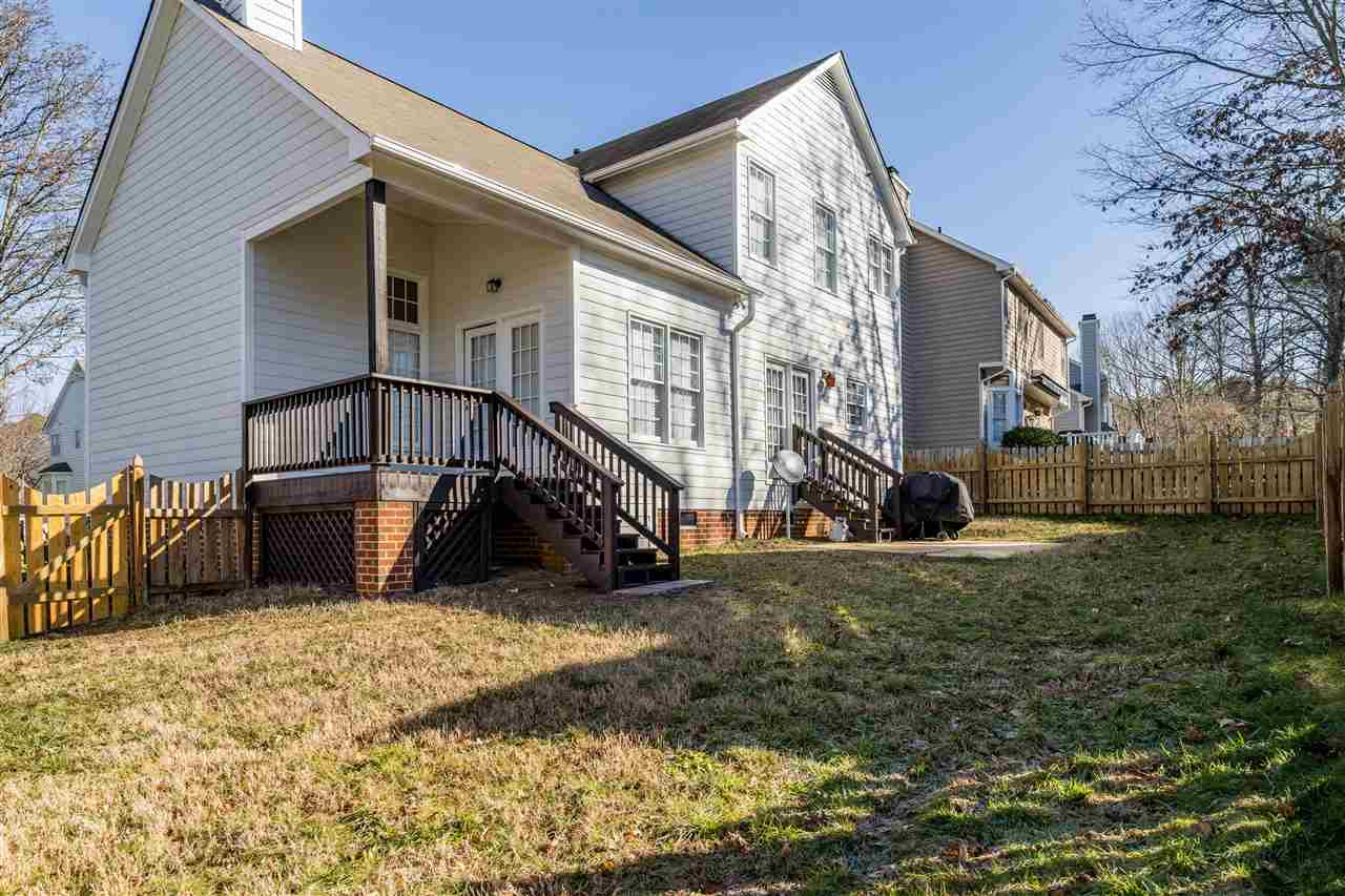 5221 Denmead Way Raleigh, NC 27613 - Photo 28 of 28 View of the lovely backyard with patio, fence and area to play! Backyard
