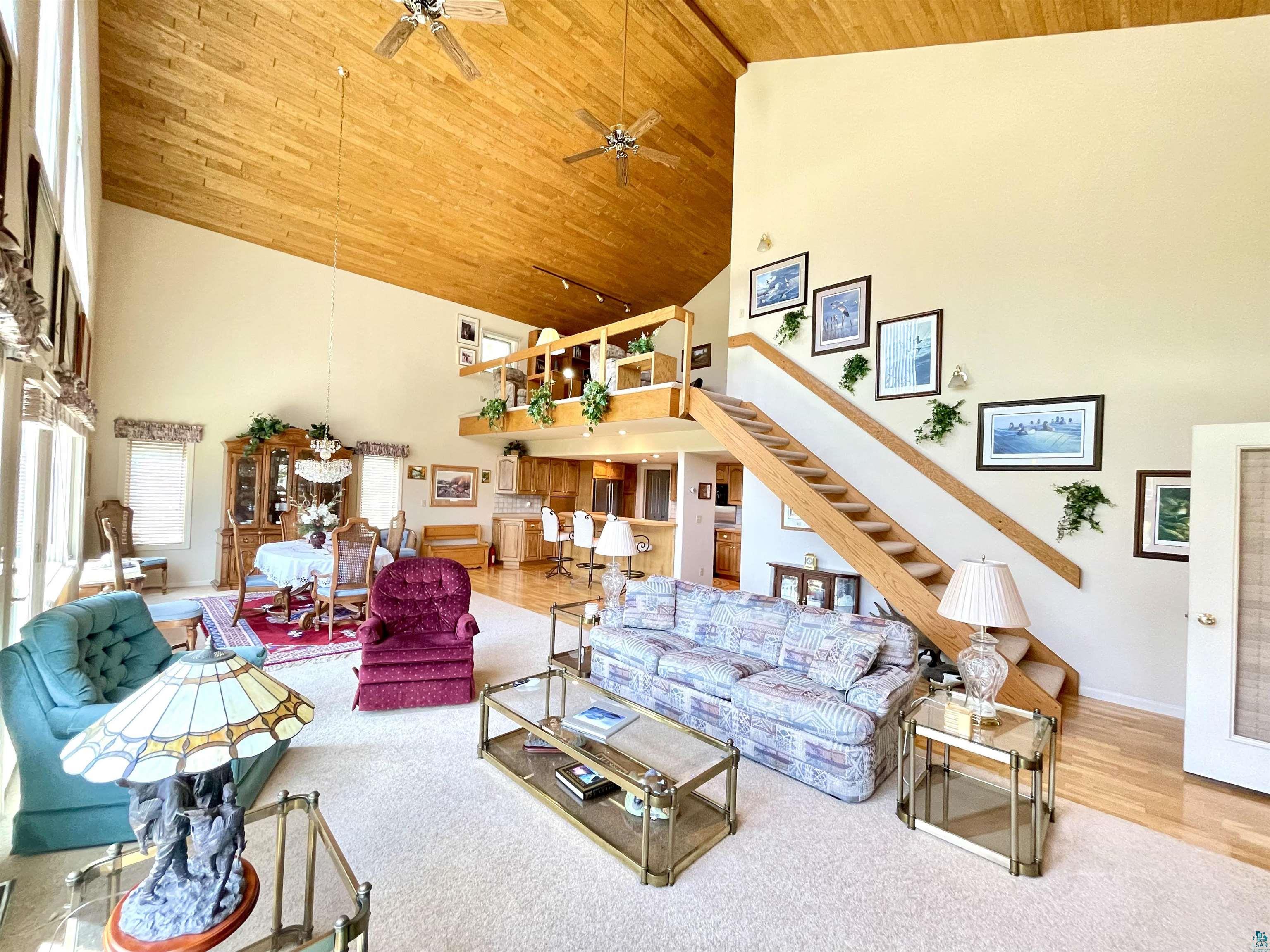 183 Cramer Road Schroeder, MN 55613 - Photo 15 of 50 Living room cathedral T & G ceilings.