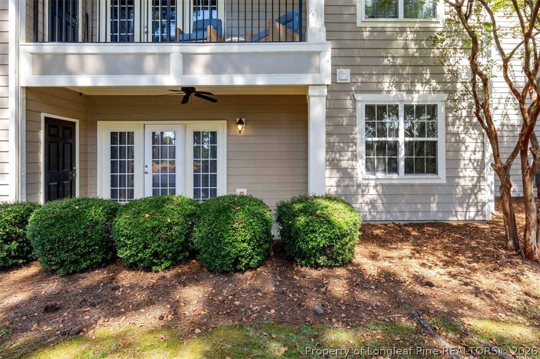 62 Gallery Drive, Unit 102 Spring Lake, NC 28390 - Photo 20 of 23 a front view of a house with garden