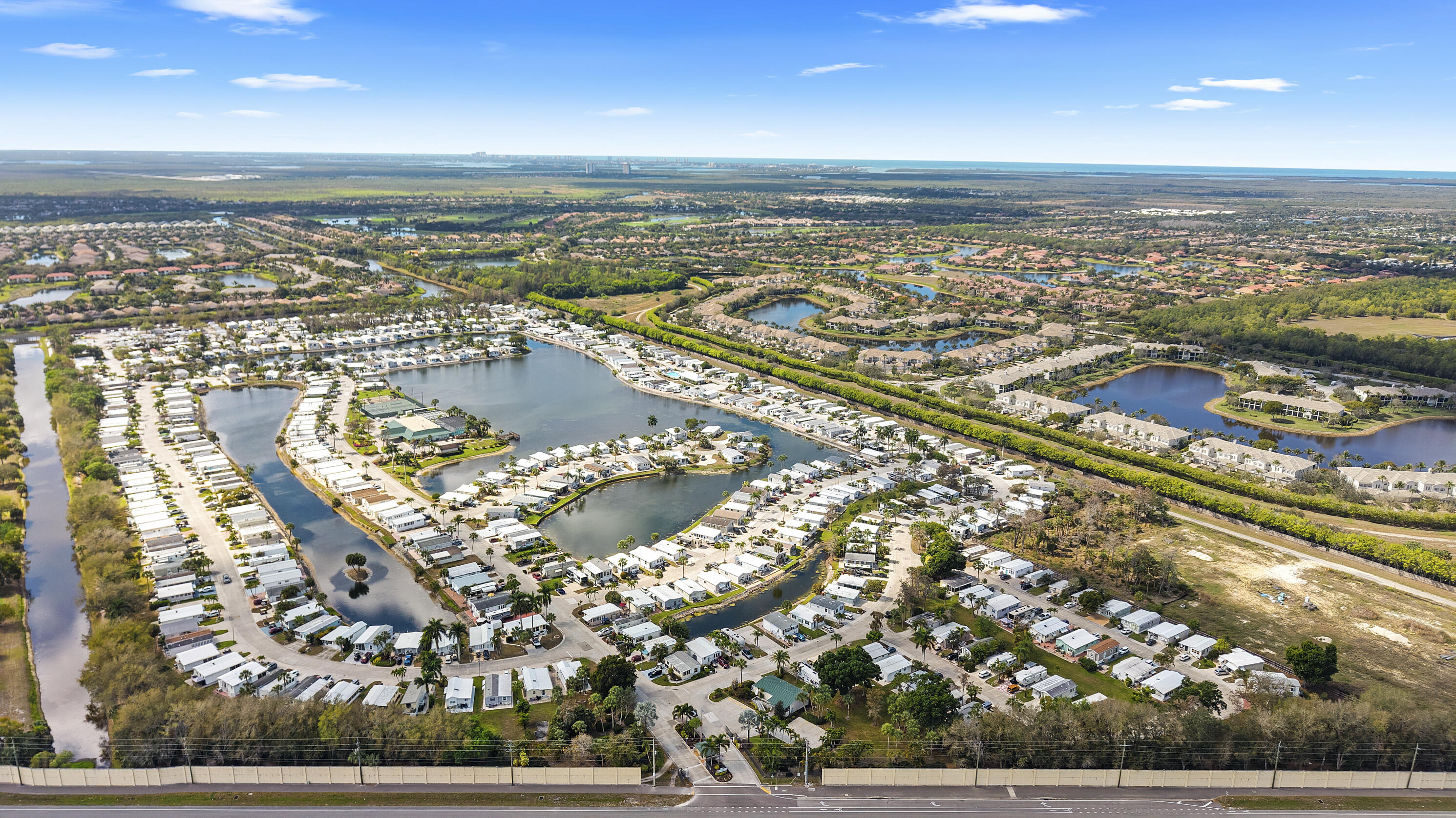 186 Panther Pass Circle Naples, FL 34114 - Photo 32 of 40 a view of a city