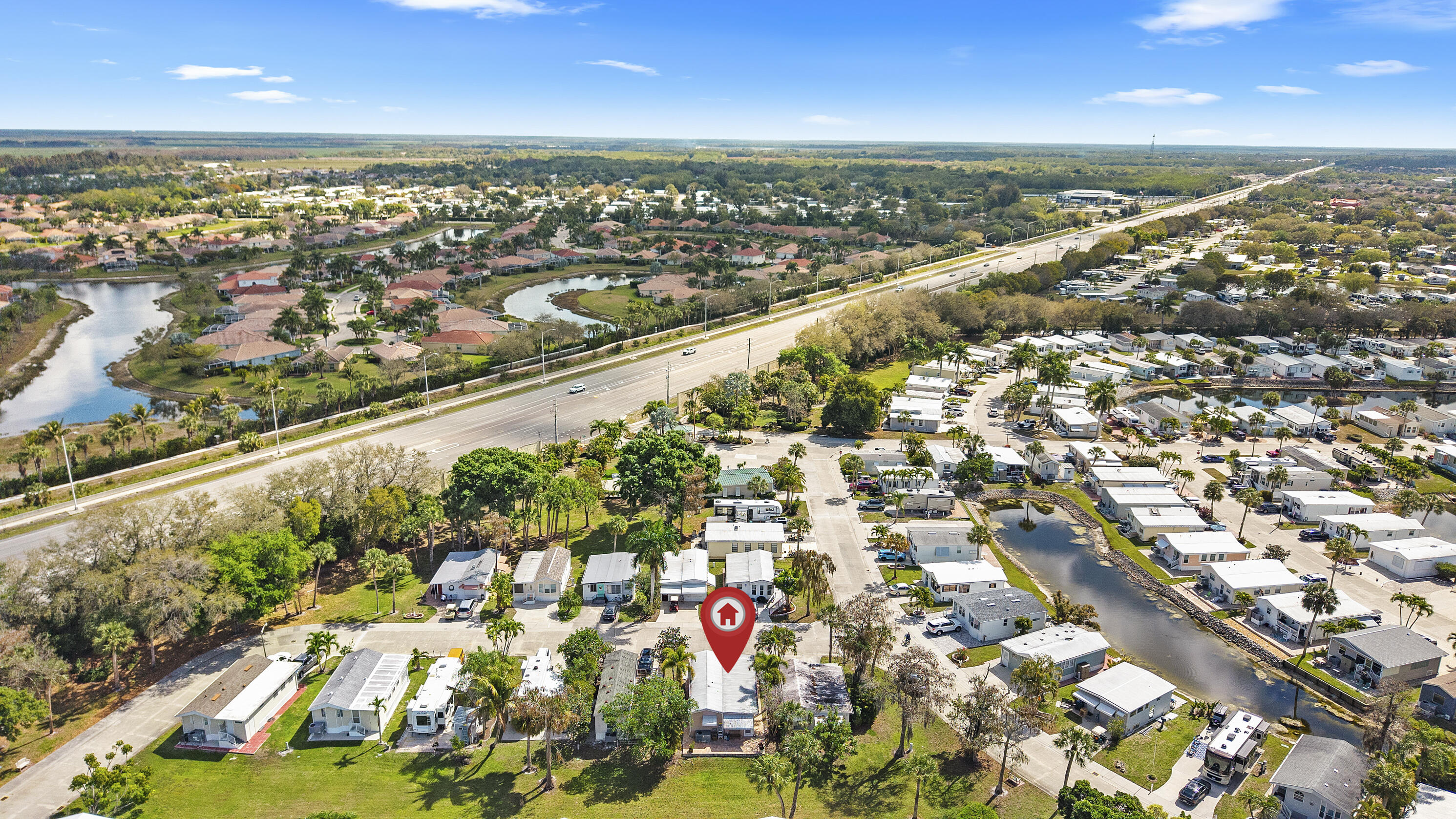 186 Panther Pass Circle Naples, FL 34114 - Photo 35 of 40 an aerial view of residential houses with outdoor space