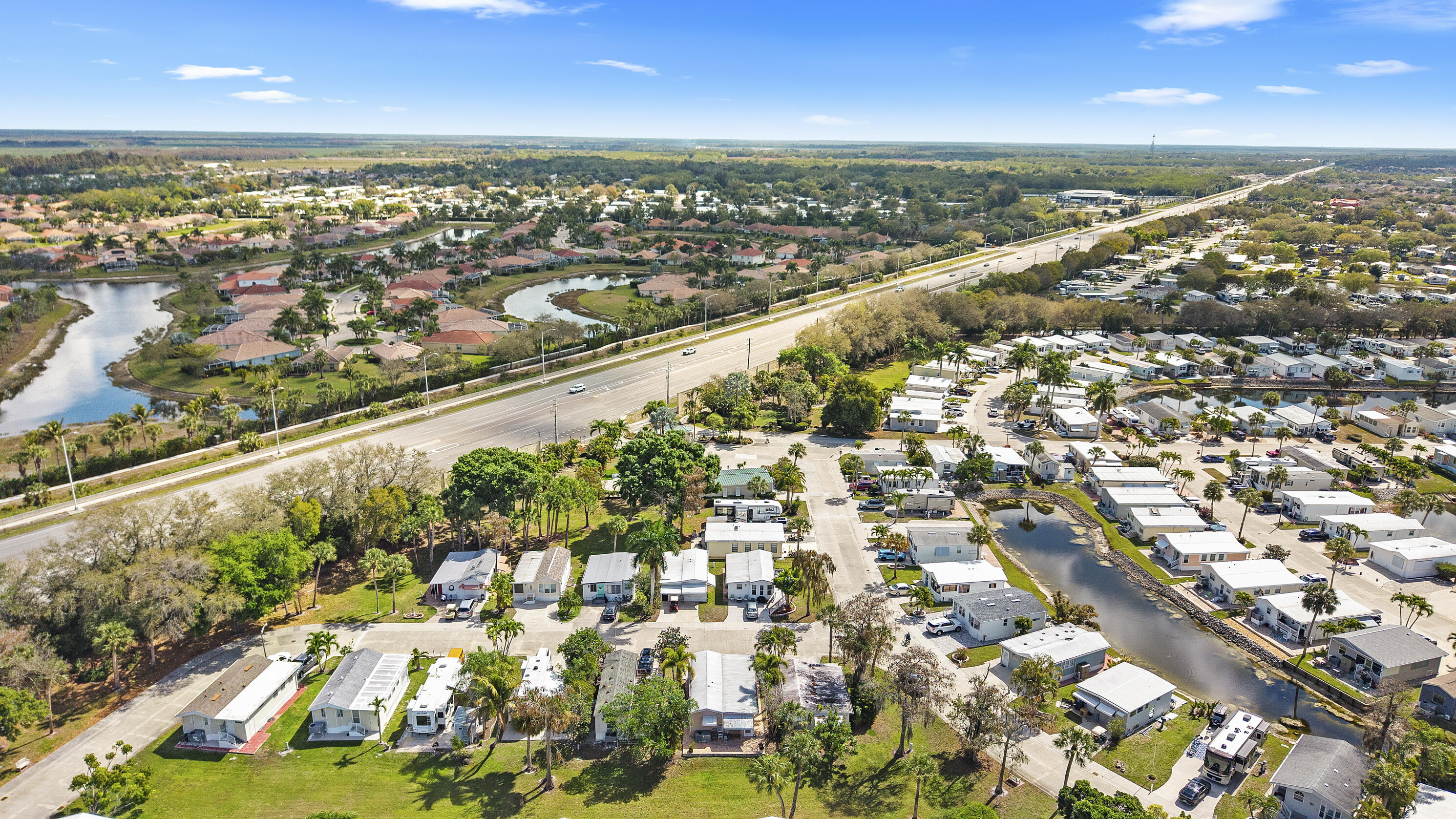 186 Panther Pass Circle Naples, FL 34114 - Photo 36 of 40 an aerial view of a city
