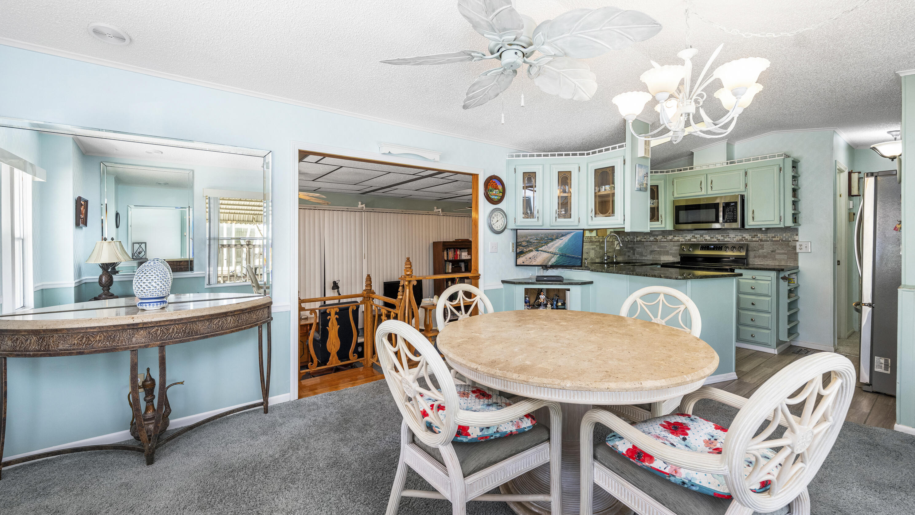 186 Panther Pass Circle Naples, FL 34114 - Photo 9 of 40 a dining room with furniture and window