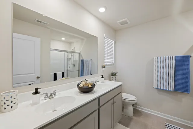 a view of a sink in a white and a dishwasher
