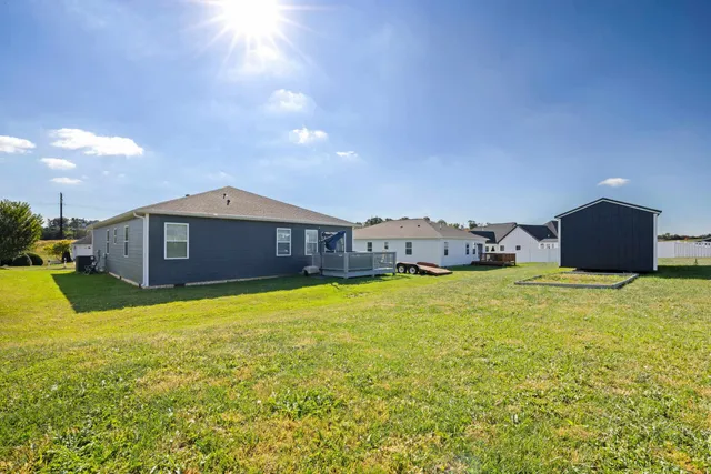 a house view with a garden space
