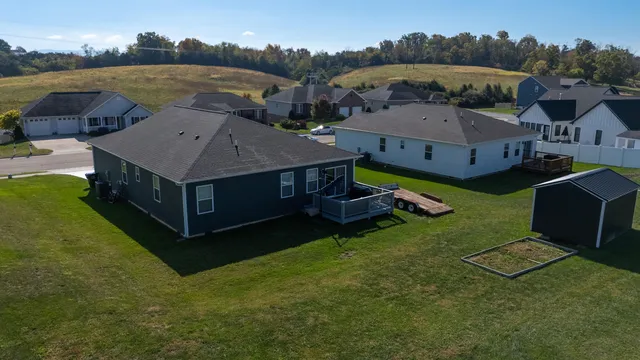 a front view of house with garden
