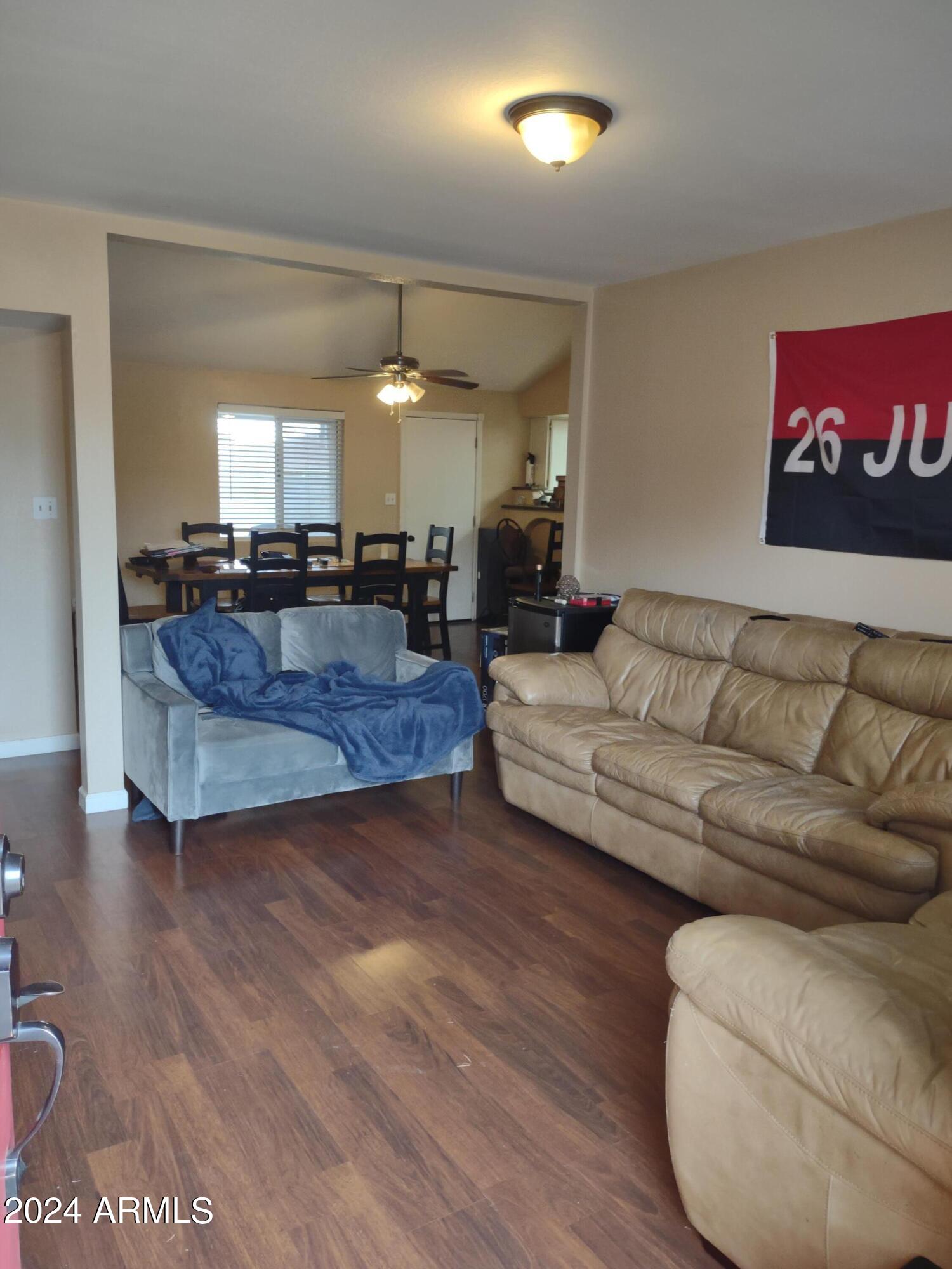 3137 East Diamond Avenue Mesa, AZ 85204 - Photo 7 of 35 Living Room Opens to Family/Great Room