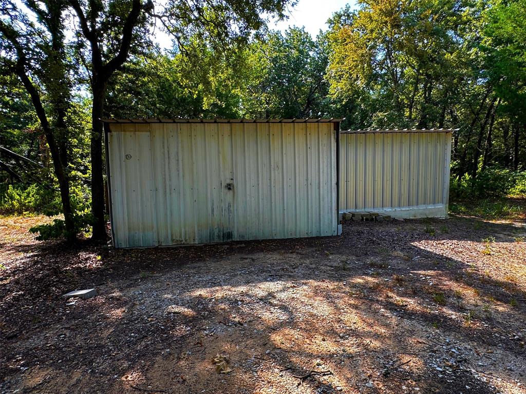 1395 Blackjack Road Valley View, TX 76272 - Photo 15 of 22 a view of backyard with green space
