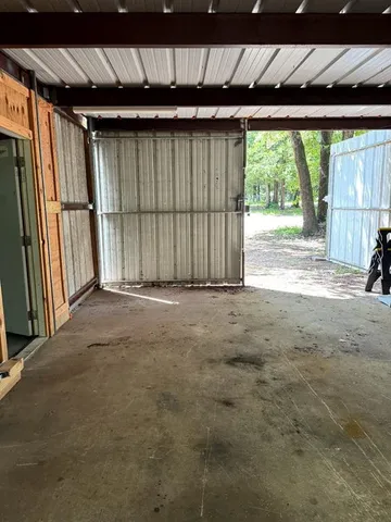 a view of a back yard from a room