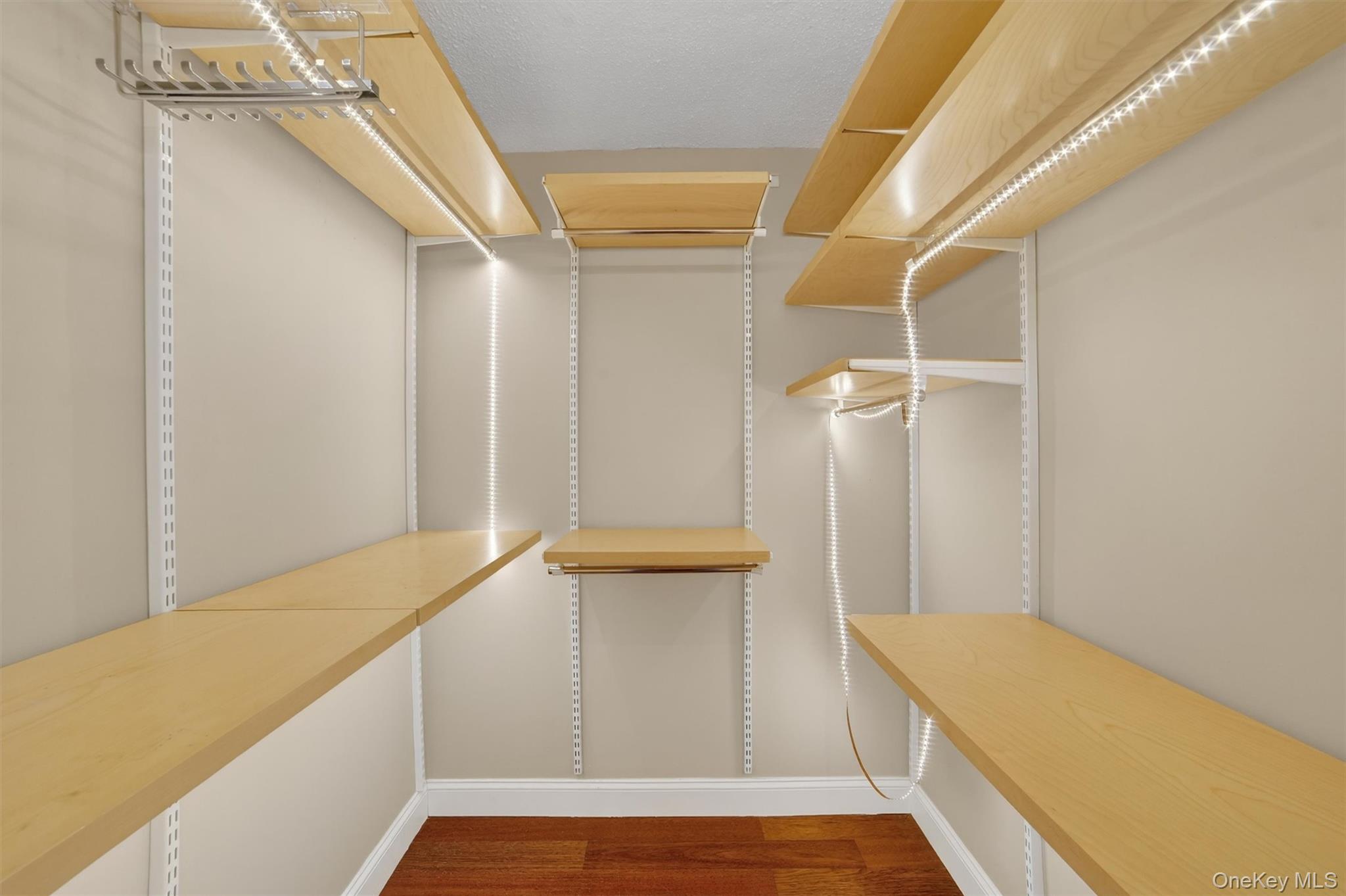 25 Rockledge Avenue, Unit 606 White Plains, NY 10601 - Photo 27 of 43 a view of walk in closet with clothes and shoes