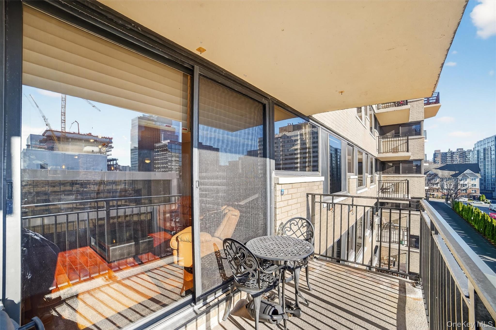 25 Rockledge Avenue, Unit 606 White Plains, NY 10601 - Photo 32 of 43 a view of a balcony with wooden floor