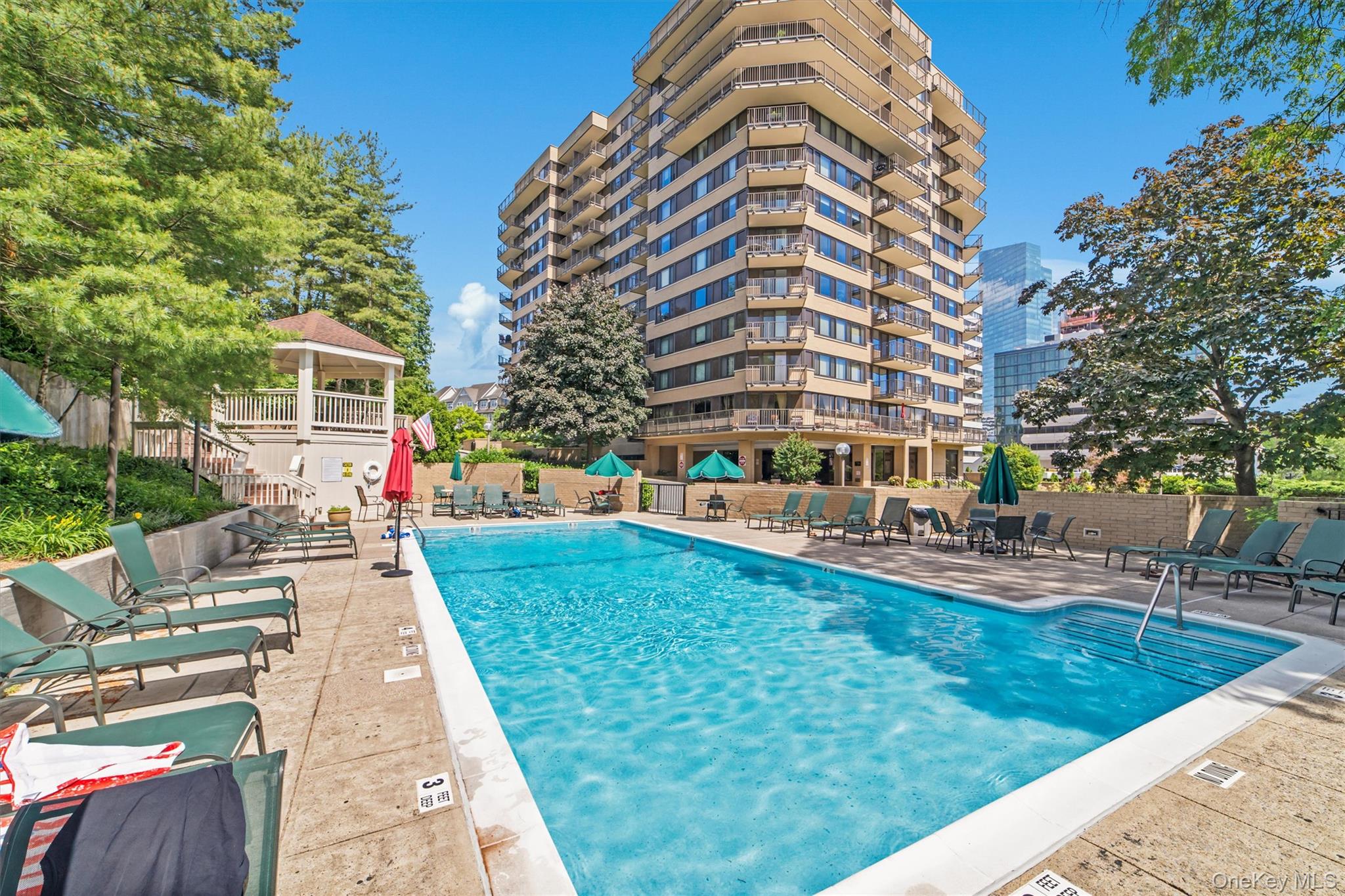 25 Rockledge Avenue, Unit 606 White Plains, NY 10601 - Photo 40 of 43 a view of a house with a yard patio and fire pit