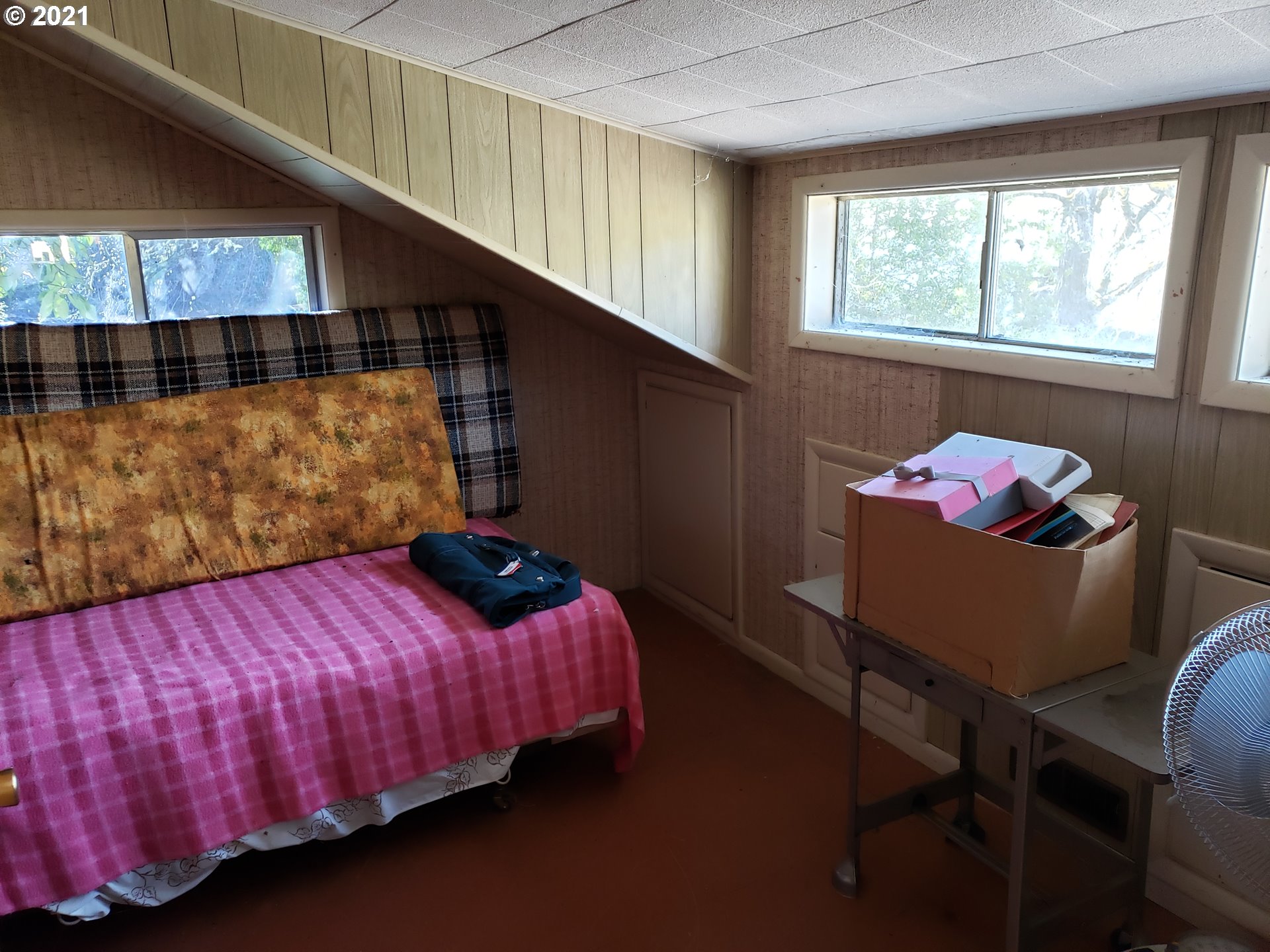 403 Meyer Lane Riddle, OR 97469 - Photo 25 of 25 a bedroom with a bed and a window
