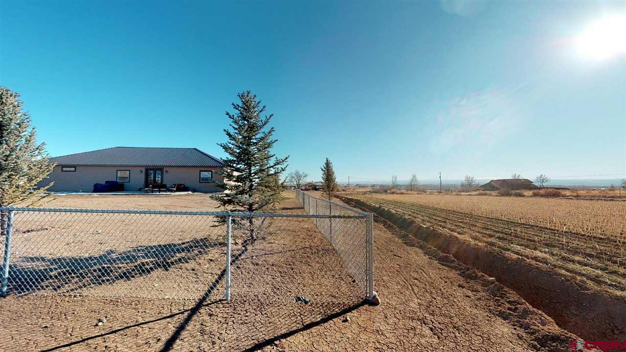 8370 2000th Road Austin, CO 81410 - Photo 3 of 35 a view of a terrace with chairs