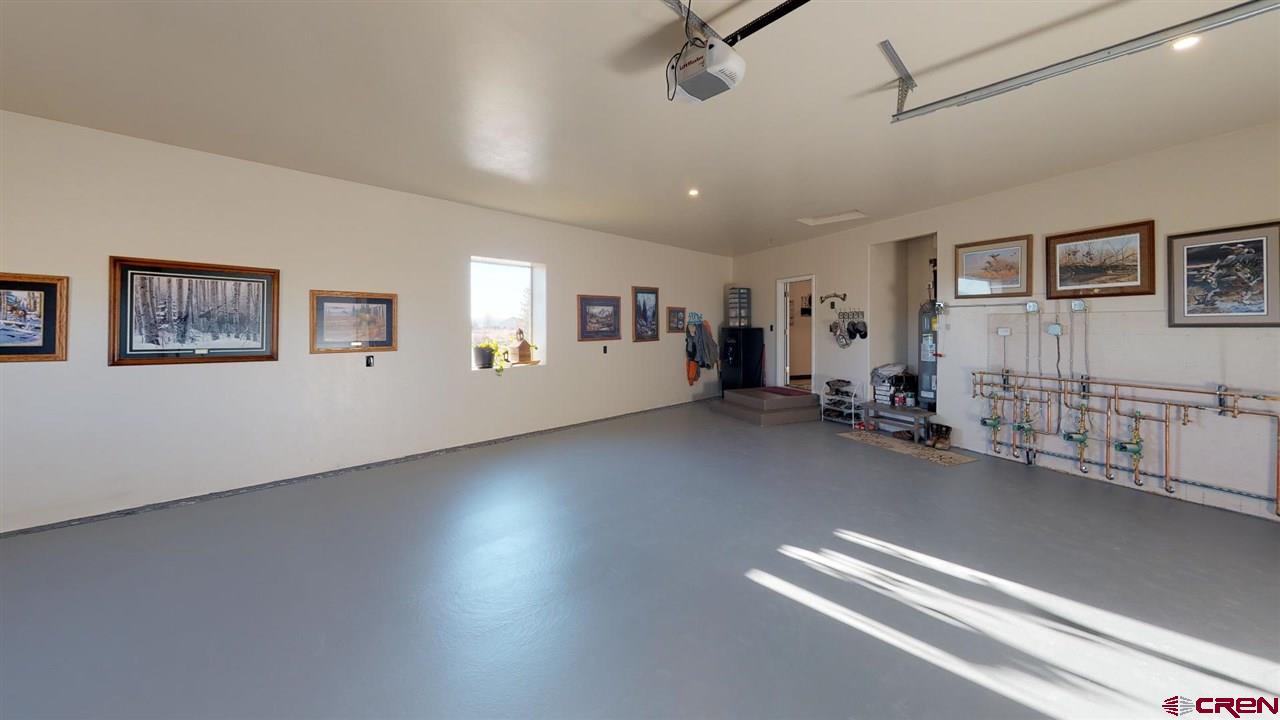 8370 2000th Road Austin, CO 81410 - Photo 33 of 35 a view of a livingroom with furniture and windows