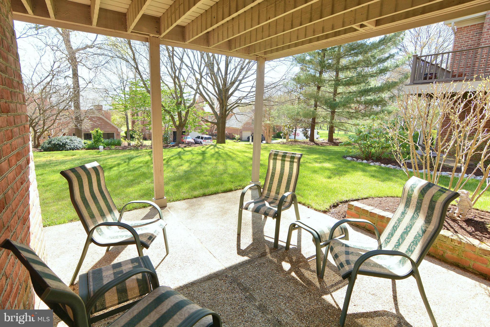 1040 South River Landing Road, Unit 1040 Edgewater, MD 21037 - Photo 21 of 30 a view of a two chairs in the patio