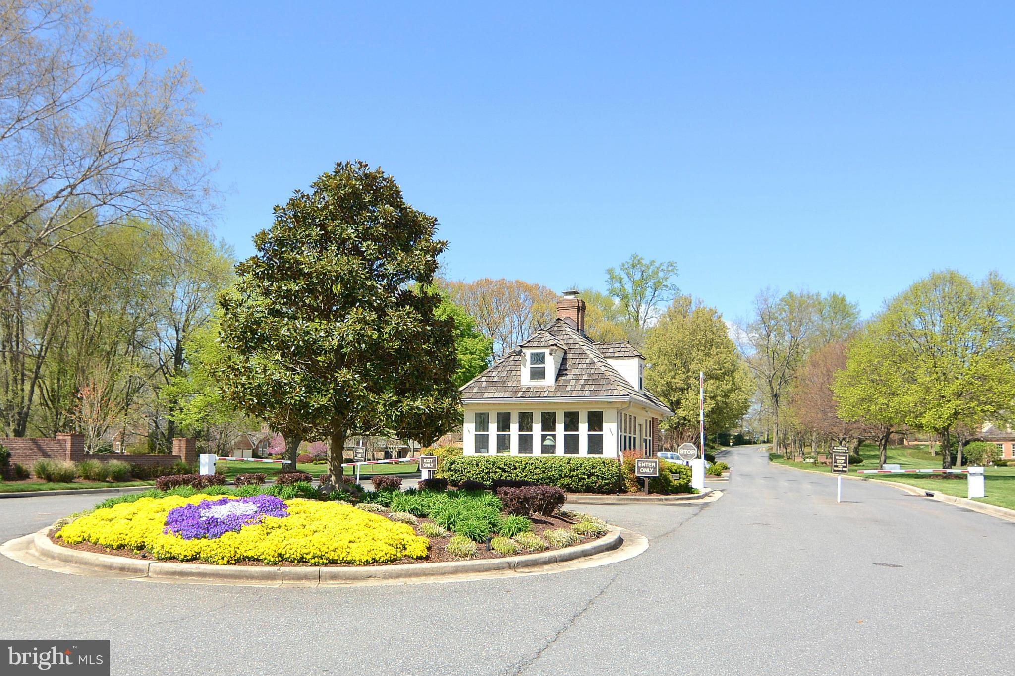 1040 South River Landing Road, Unit 1040 Edgewater, MD 21037 - Photo 30 of 30 a front view of a house with a yard