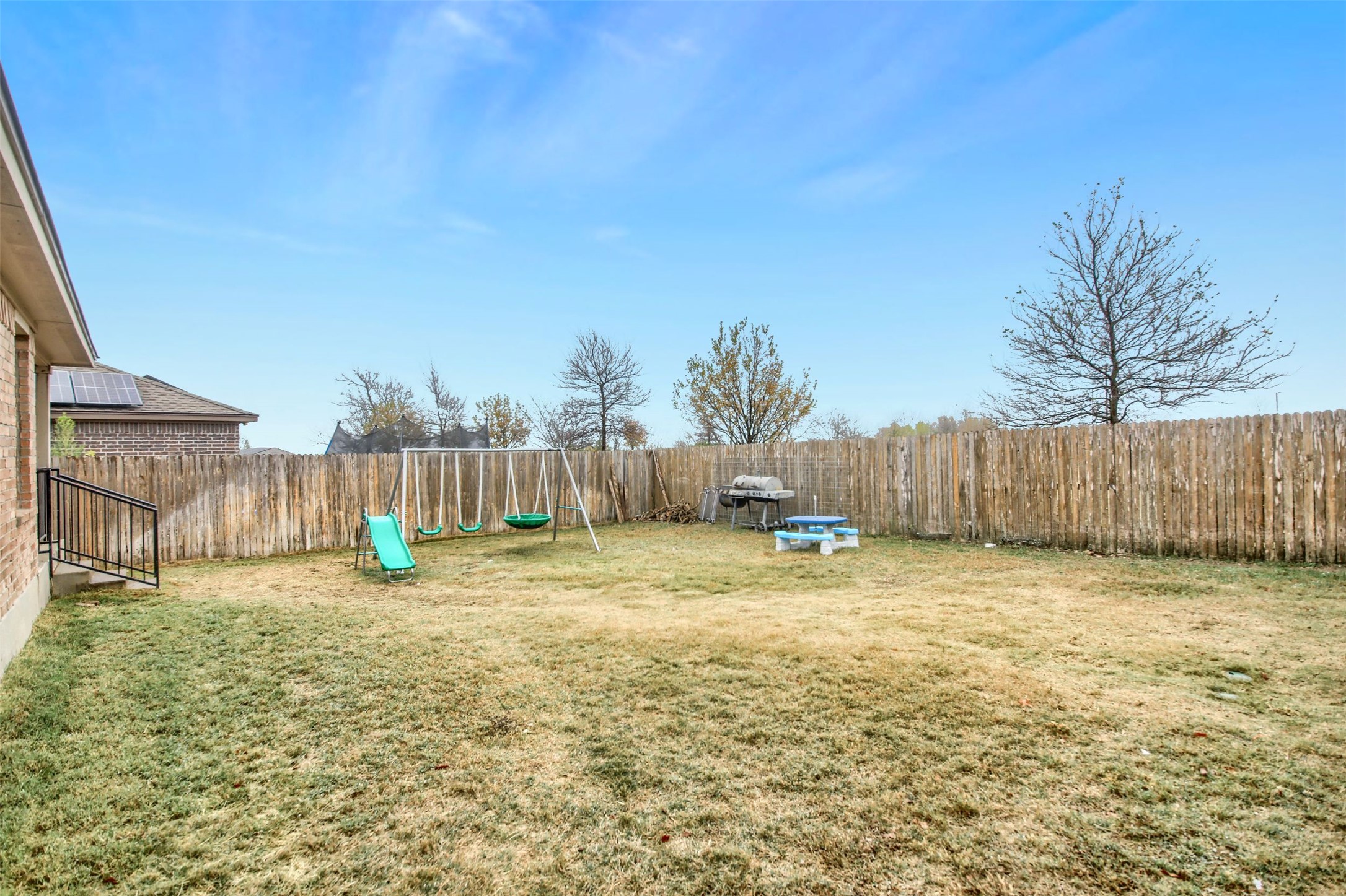 18005 Moreto Loop Pflugerville, TX 78660 - Photo 25 of 25 Fenced backyard featuring a playground