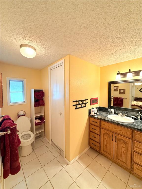 101 Rim Drive Mission, TX 78574 - Photo 11 of 17 a kitchen with stainless steel appliances granite countertop a sink and cabinets