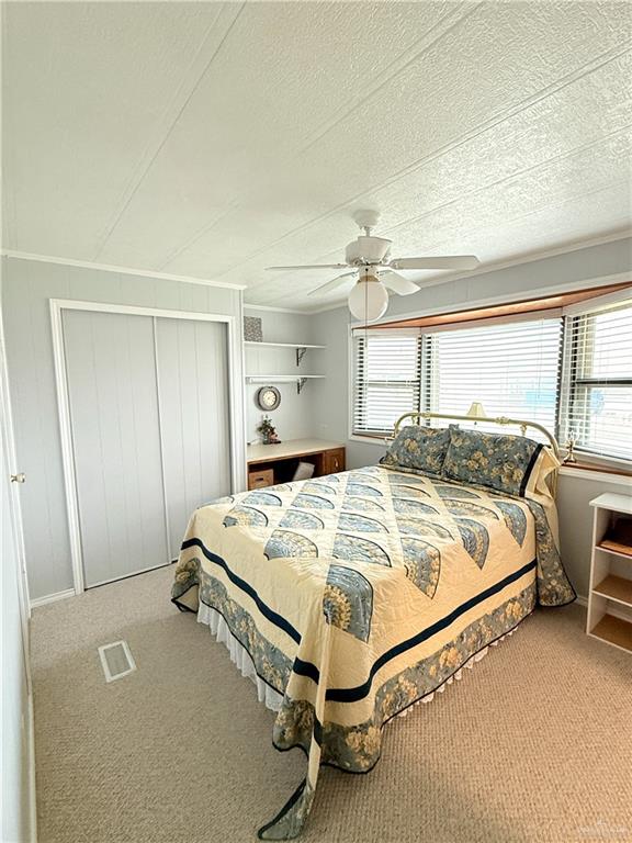 101 Rim Drive Mission, TX 78574 - Photo 13 of 17 a bed sitting in a bedroom next to a window