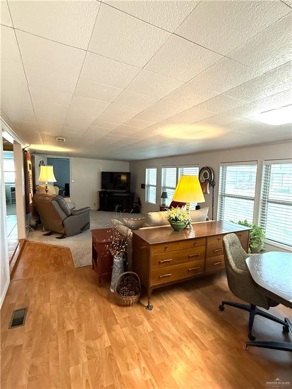 101 Rim Drive Mission, TX 78574 - Photo 5 of 17 a living room with furniture and a flat screen tv