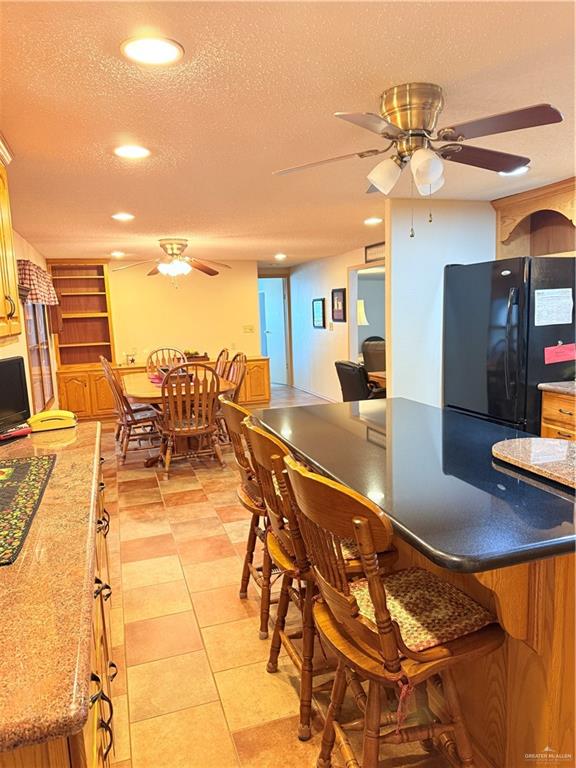 101 Rim Drive Mission, TX 78574 - Photo 8 of 17 a view of a swimming pool with seating area