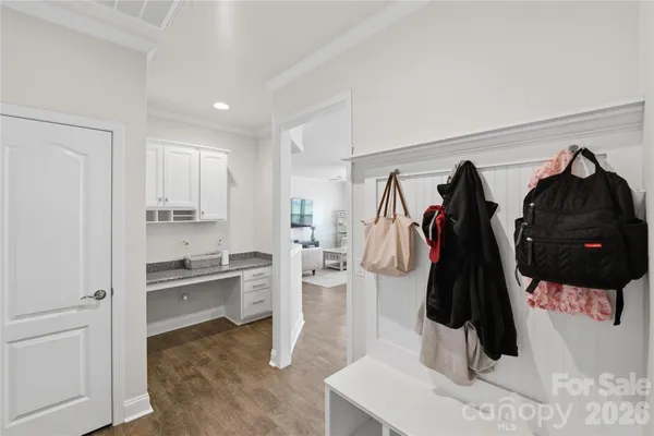 a walk in closet and a bathroom