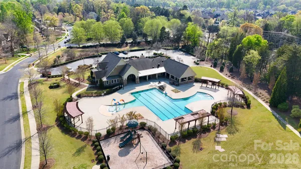 swimming pool with a yard
