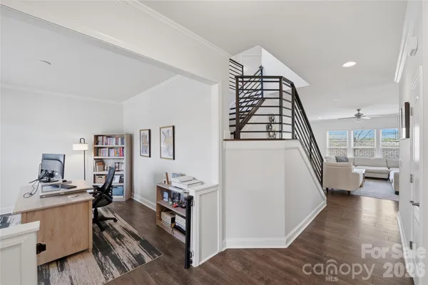a view of livingroom with furniture and staircase